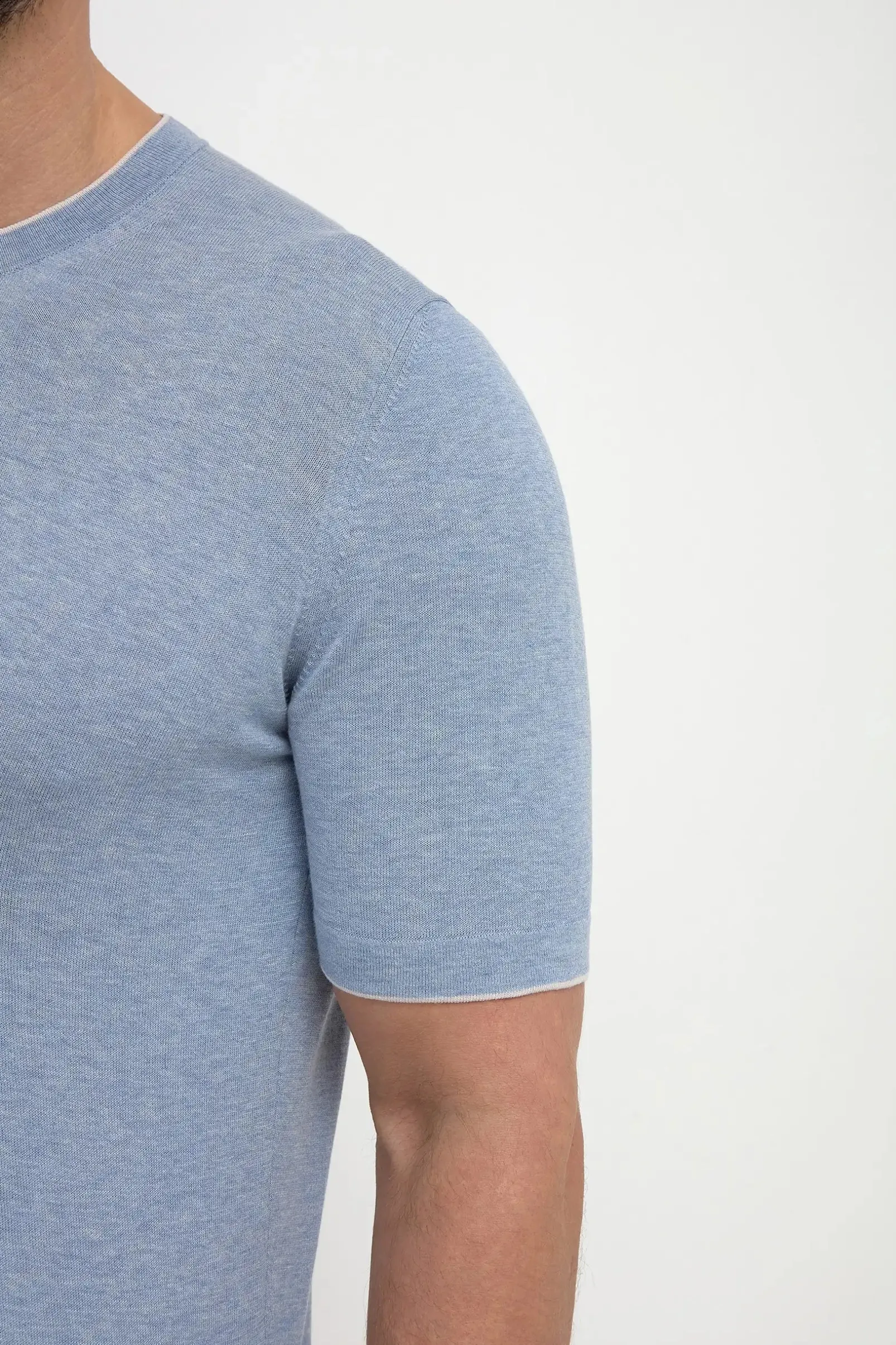 dusty_blue_knitted_tshirt_1.webp Dusty blue knitted t-shirt - Made in Italy