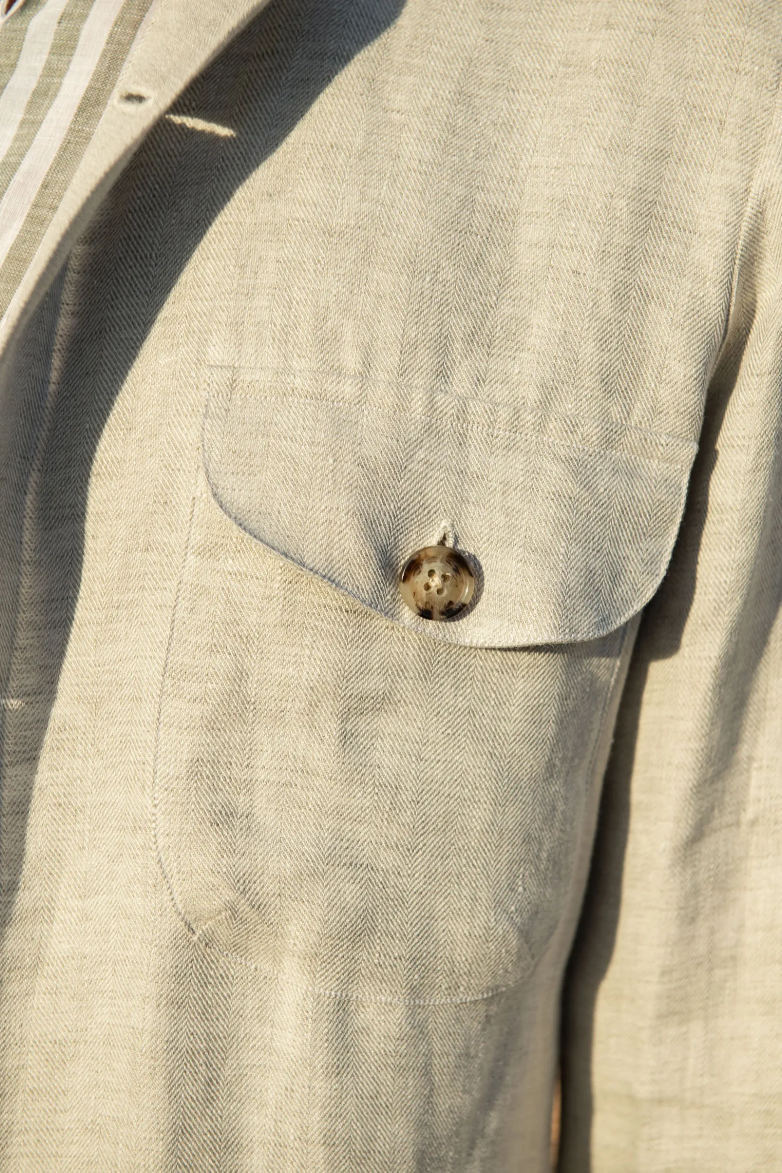 stone_herringbone_linen_s_1.webp Stone herringbone linen safari jacket – Made in Italy
