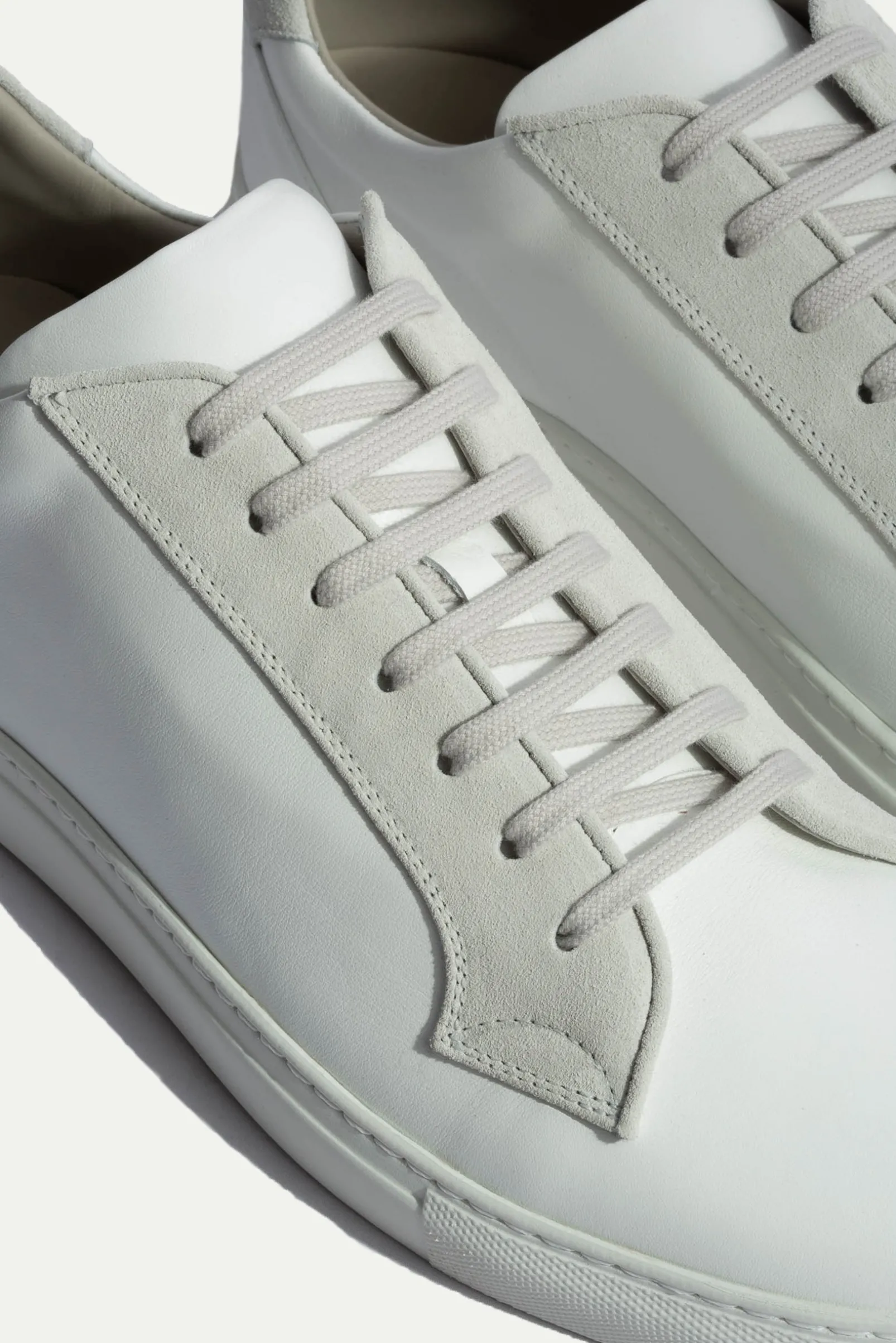 white_sneakers_with_grey__1.webp White sneakers with grey suede detail - Made In Italy